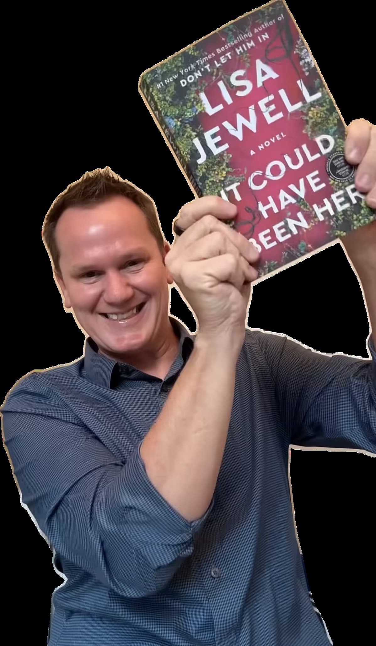 Michael Norris of I Heart A Good Thriller smiling and holding up Lisa Jewell's thriller It Could Have Been Her